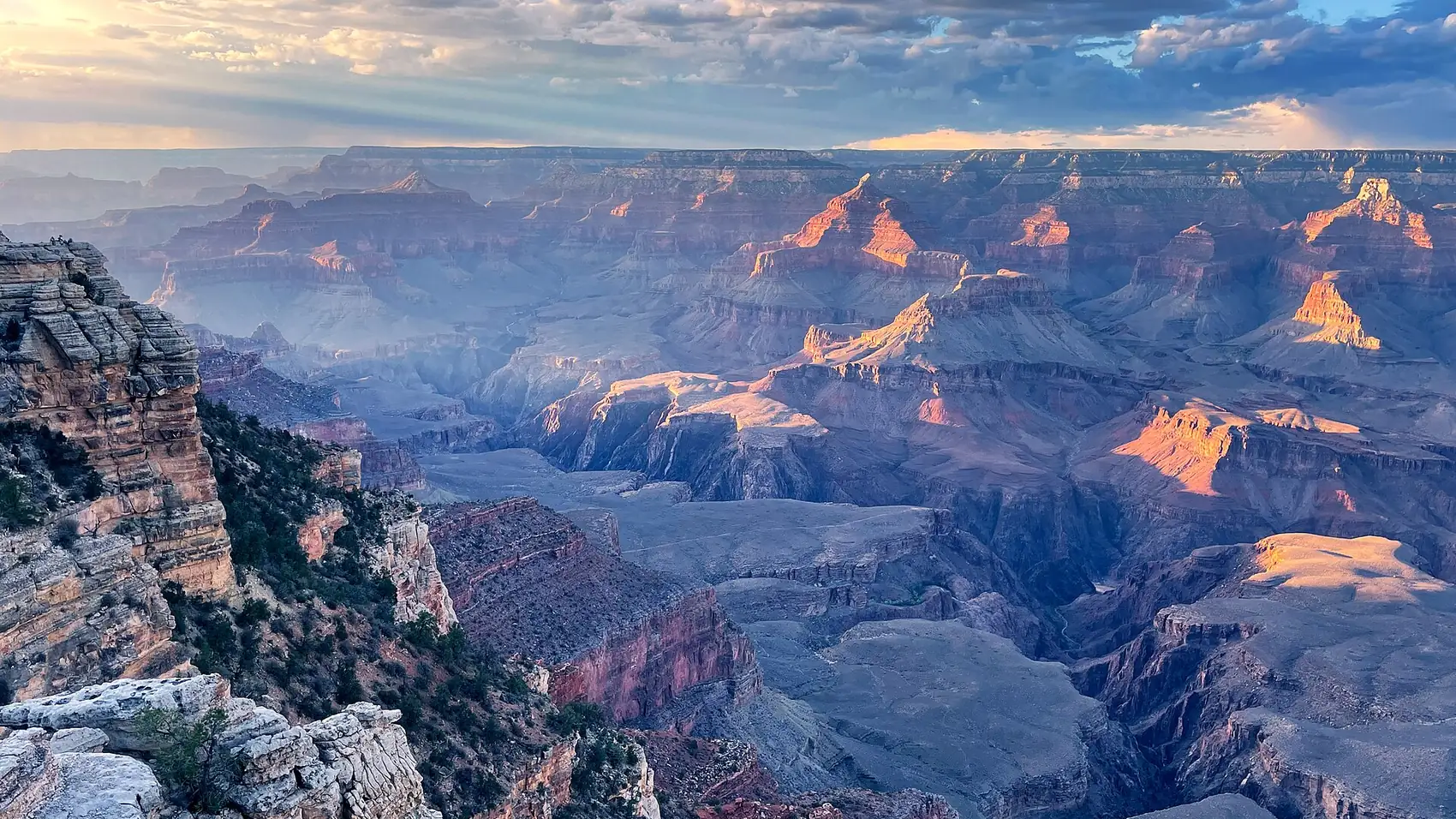 First light striking the buttes of the Grand Canyon from Mather Point