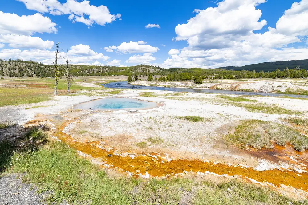 The orange bacterial mats and blue centre of Grand Prismatic Spring